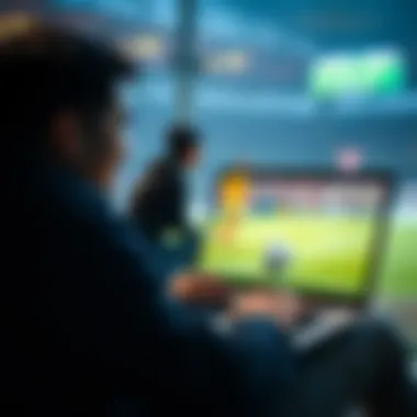 A fan enjoying a football match on a laptop